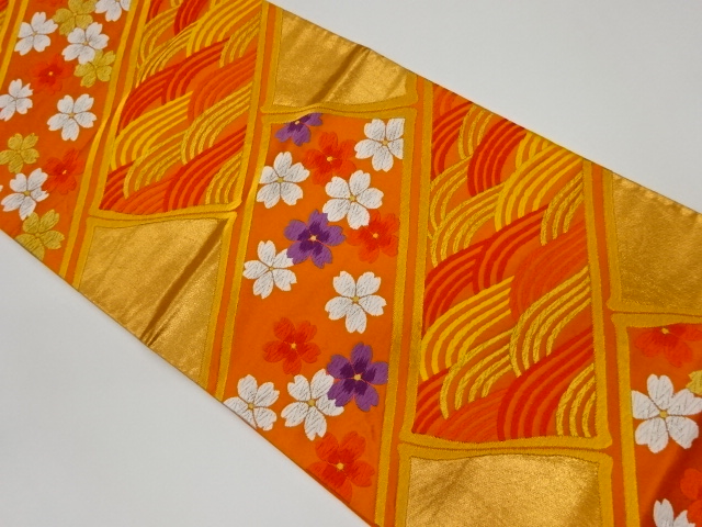 斜め竹取に桜・波模様織出し袋帯